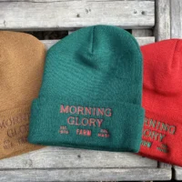 Morning Glory Farm beanie hats in tan, red, and turquoise from Martha’s Vineyard