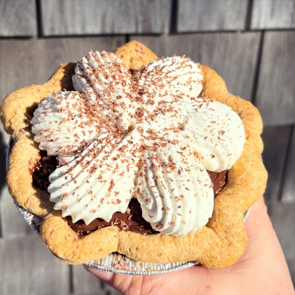 Valentine’s Day bakery treats featuring a handmade chocolate cream pie topped with fresh whipped cream at Morning Glory Farm