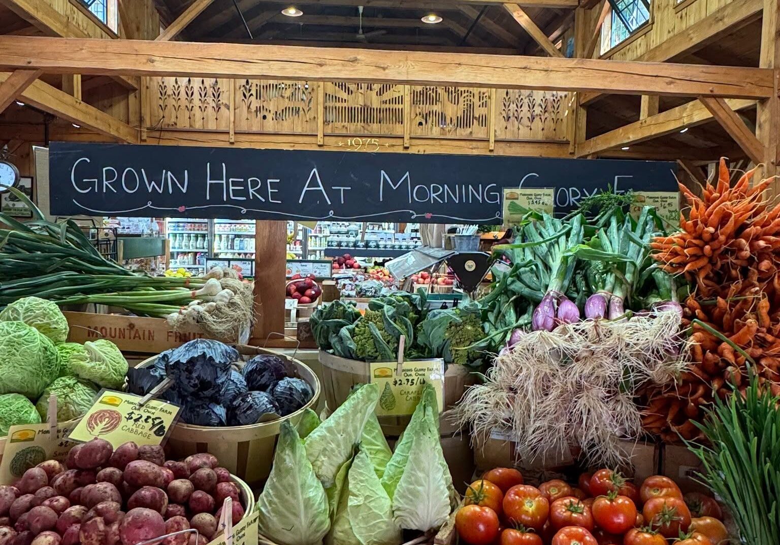 Fresh Farm Vegetables displayed inside the Morning Glory Farm farmstand during peak summer harvest on Martha's Vineyard.